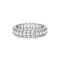 Sterling silver eternity ring with continuous row of brilliant moissanite stones in scalloped crown setting with milgrain detail