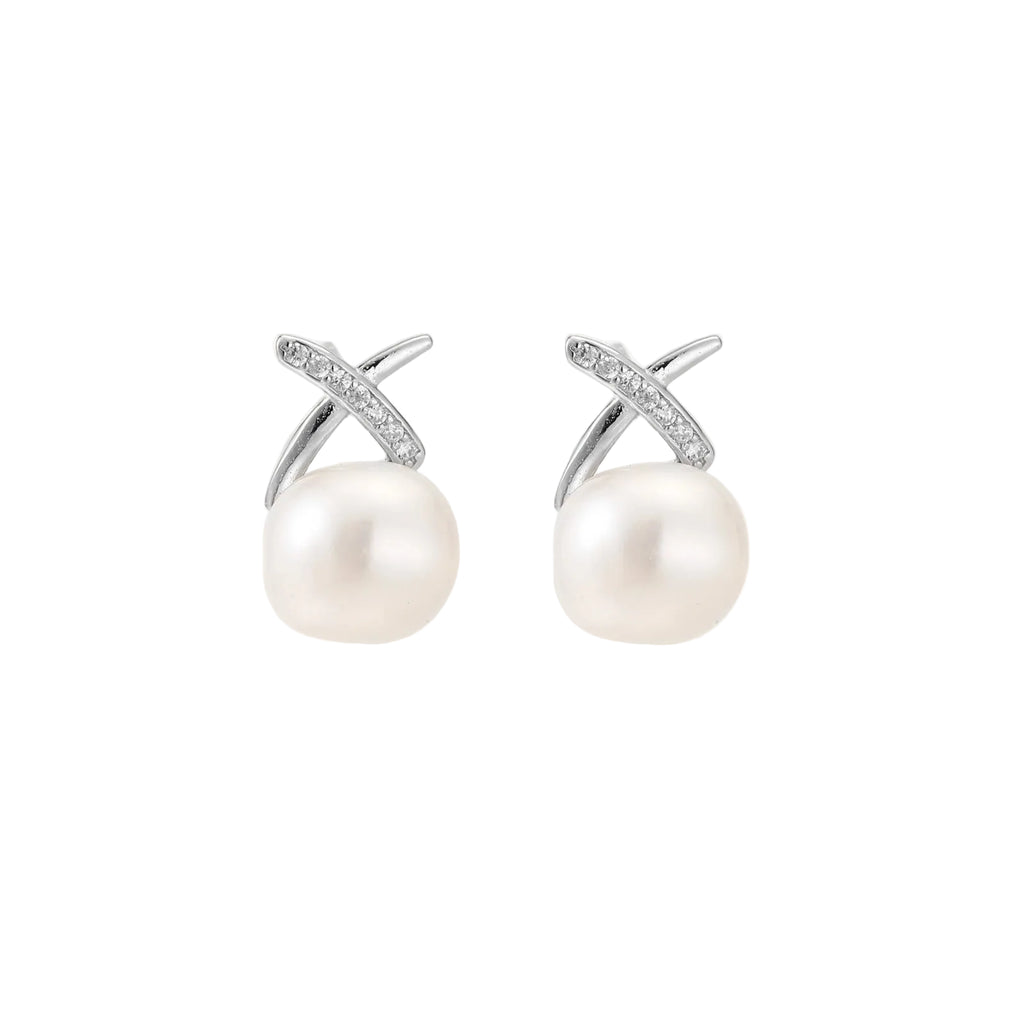 Rhodium-plated silver stud earrings with sparkling X design above lustrous round freshwater pearls on white background.